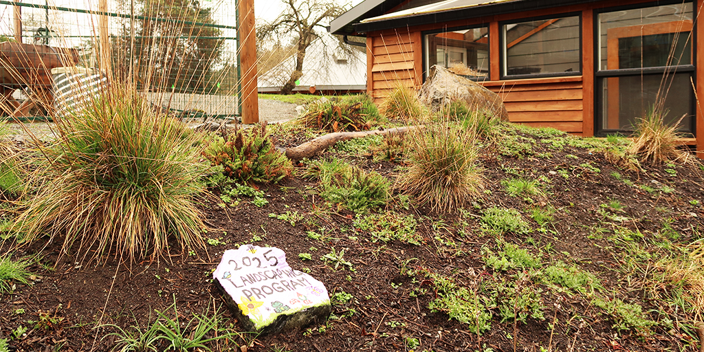 New garden area with signage for Power To Be’s landscape stewardship program. (Image: S. Careri)