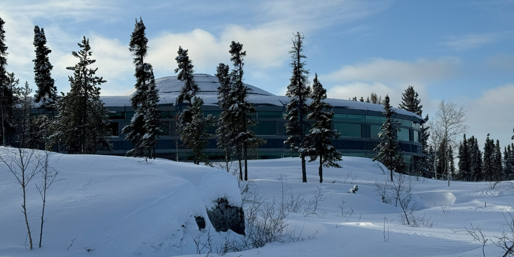 NWT Legislative Assembly building seen through the snow.