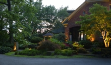 Use of the Japanese principle of “Shin Sho”, subtle lighting, and textural plantings highlight the entry; reclaimed sandstone blocks create layers stepping up to the glassed hall piercing the traditional architecture.  