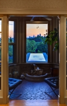 The reflecting pool, visible from all sections of the home, serves as a modernist focal point and occasionally as a wading pool for the family grandchildren.