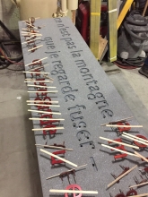 Preparation of bronze letters to be set in stone