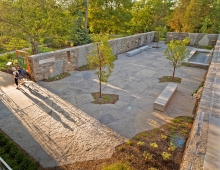 The new entry garden, formally named The Dalglish Family Courtyard, is a design essay on the quarry expressed through stone, water, and rockery plantings.