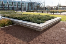 All forms are abstracted – for example, building locations are marked by low platforms that are stylized versions of the foundation stones.