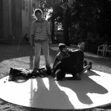 Visitors kneel down, one visitor at a time, and peer into the keyhole to view film below ground