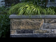 At the base of the front steps to the newly designed entrance to the home, a stone wall reads, "Cead Mile Failte" in Gaelic — or "100,000 welcomes" connecting to the owner's Irish roots.