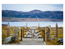 The whale bone arch anchors and frames the view towards the ocean, symbolizing the afterlife
